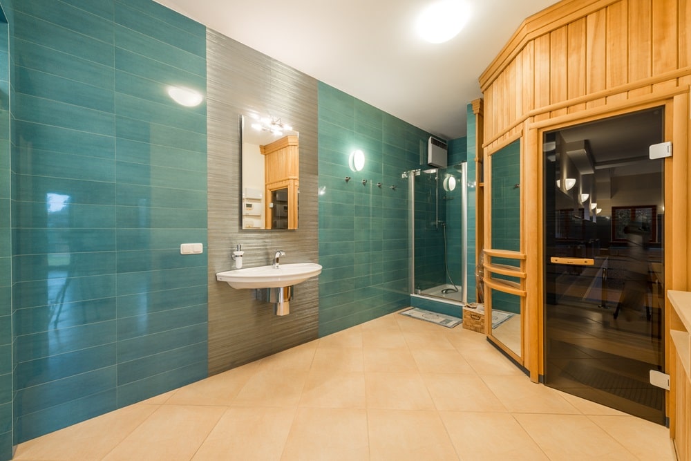 indoor sauna cabin installed in a modern bathroom